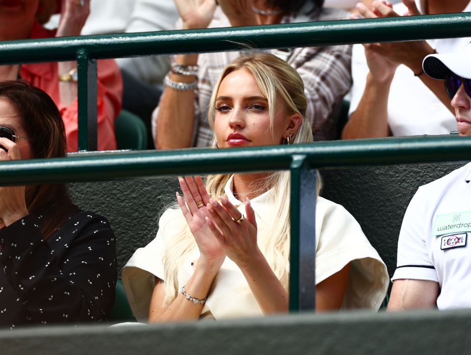 Morgan Riddle cheered on her boyfriend Fritz from the player box