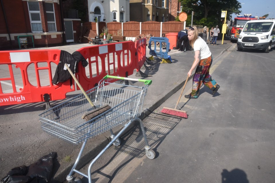 Local residents have joined in as council workers brushed up the dirt and dust