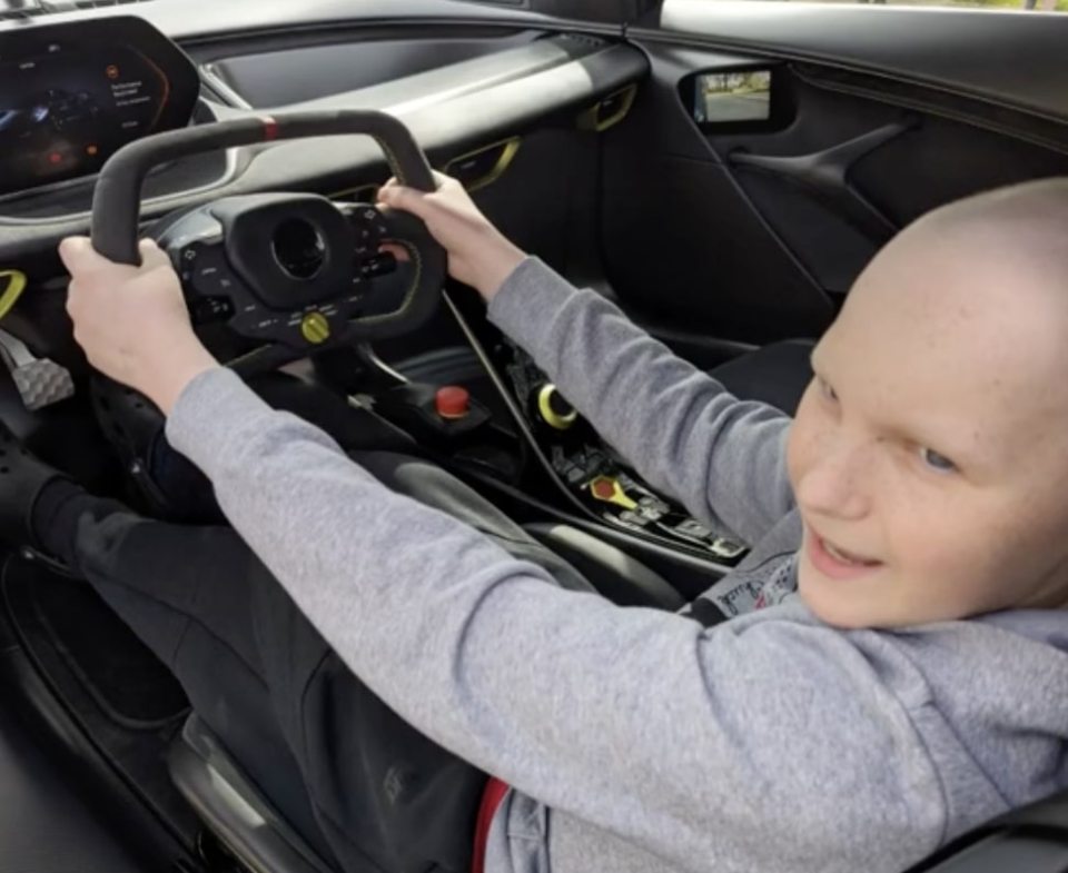 Jake fulfilling his dream of riding in a Lotus supercar