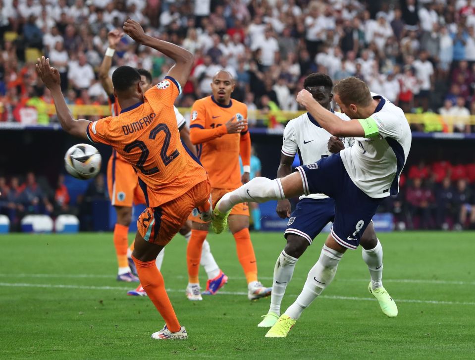 England were awarded an unexpected penalty after Denzel Dumfries challenge on Harry Kane