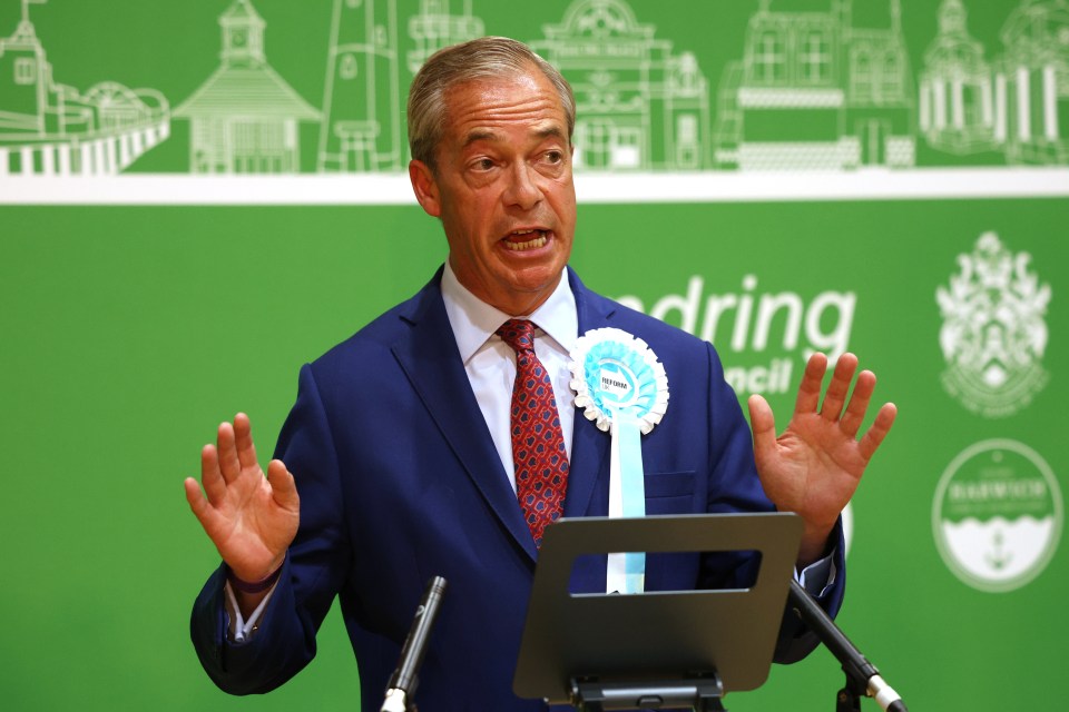 a man in a suit and tie is giving a speech in front of a green background that says ' ring council '