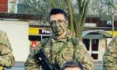 Kyle Clifford can be seen posing in his Army gear