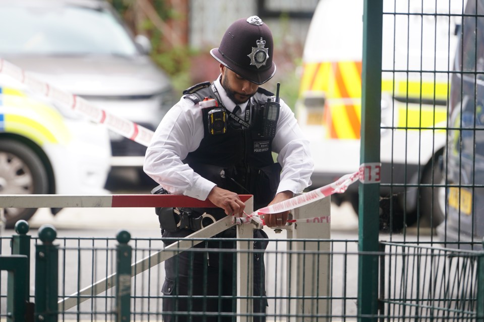 a police officer in a helmet with the letter o on it