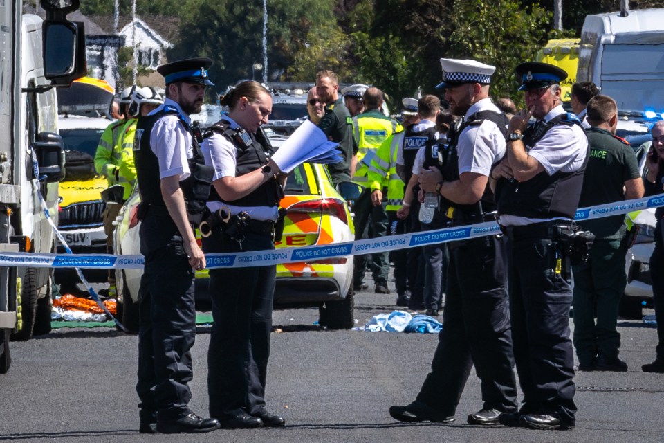 Police in Southport, Merseyside, after two children were killed in a horror rampage