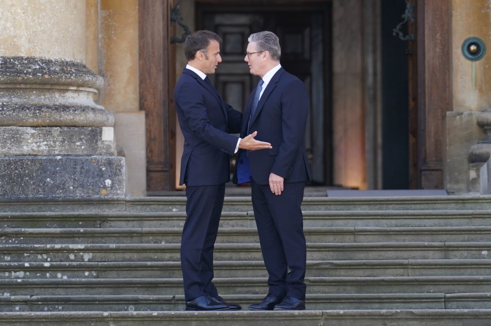 French President Emmanuel Macron is welcomed by Sir Keir Starmer to the European Political Community summit at Blenheim Palace