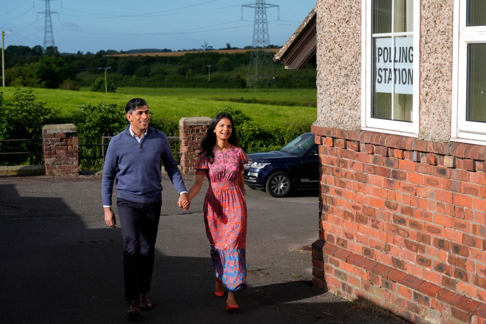 Prime Minister Rishi Sunak and his wife Akshata Murty arrive to cast their vote at Kirby Sigston Village Hall in Northallerton, North Yorkshire