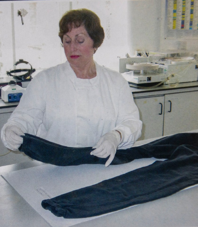 Sarah investigating a pair of pants in a lab