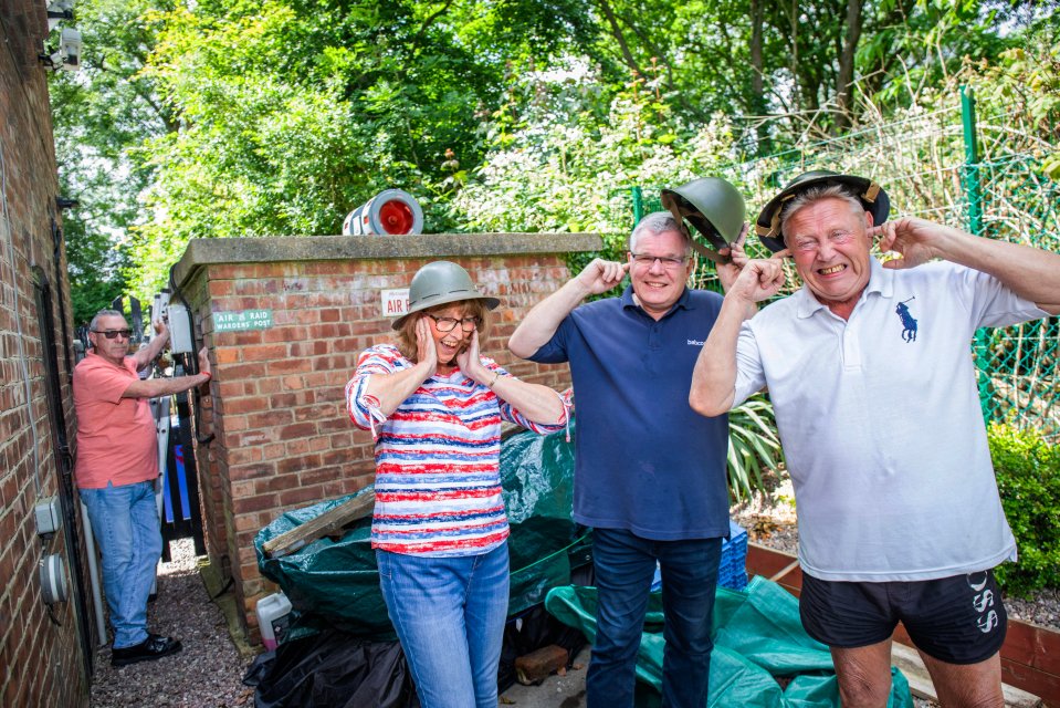 Neighbours Marguerite Young, Tom Hunter and Gerry Goodwin react to the loud noise