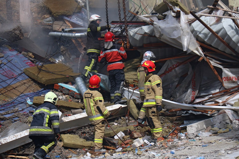 Rescue workers tirelessly searched the rubble for any people on Monday