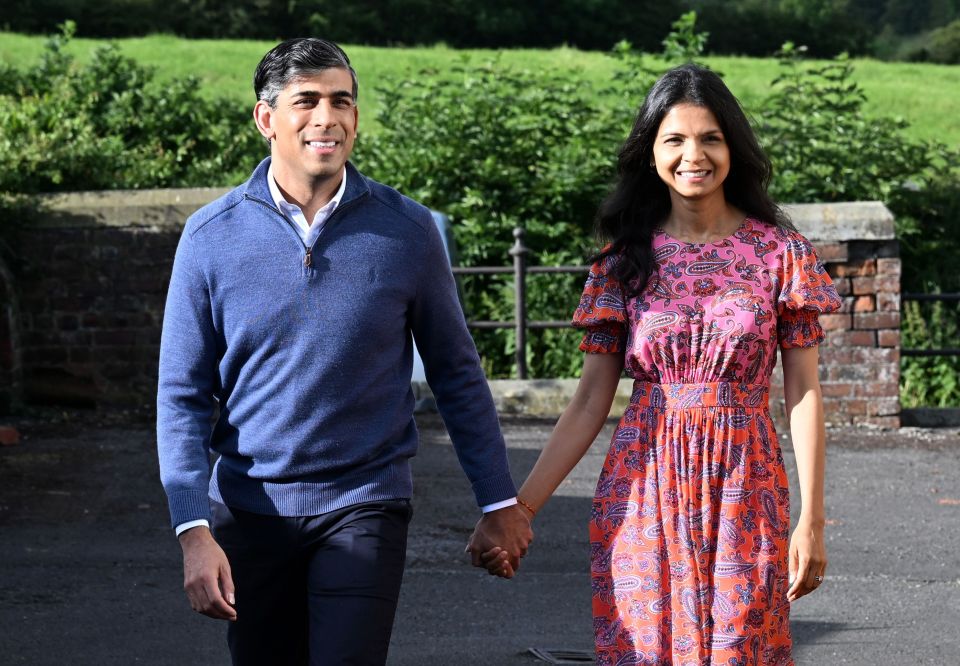 Rishi Sunak and his wife Akshata Murty arrive to vote