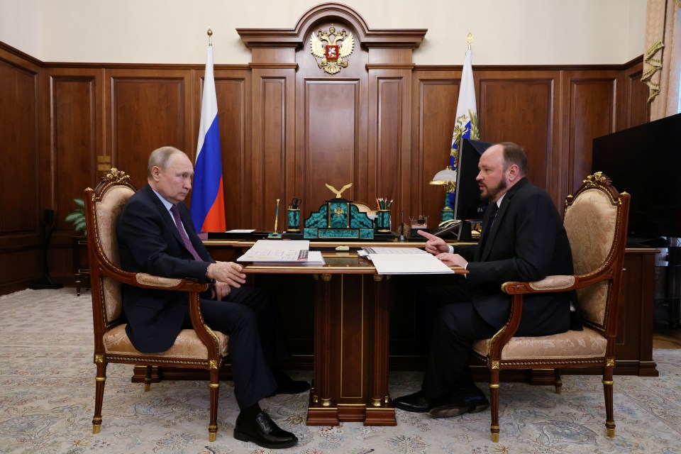 Putin meeting with pal Andrey Guryev at the Kremlin in Moscow