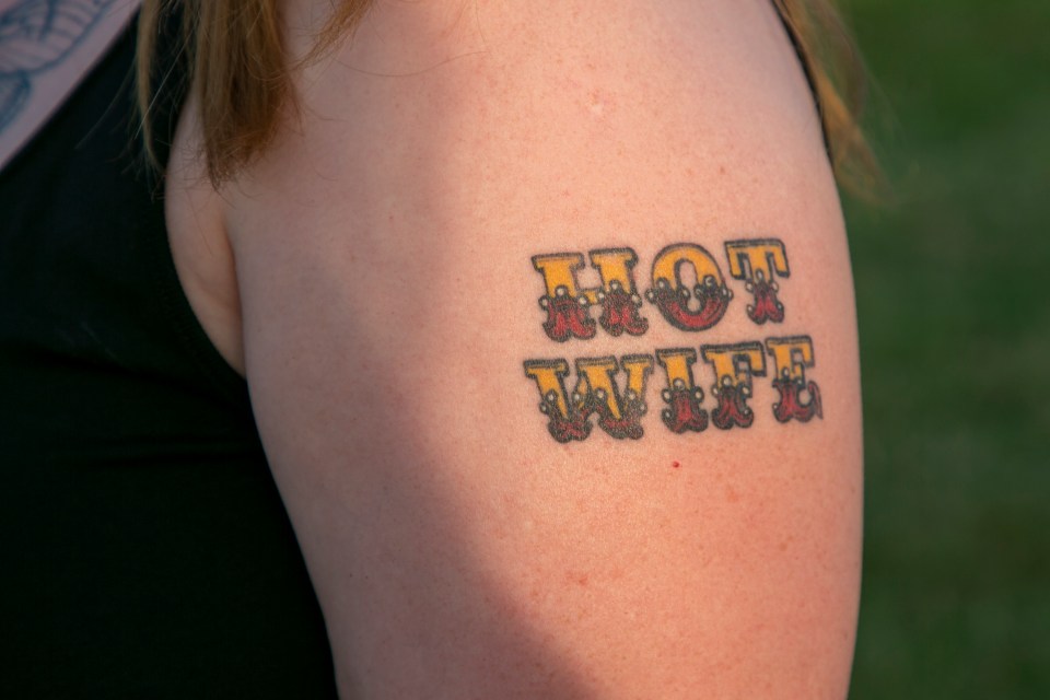 Festival attendee Char shows us her 'Hot Wife' tattoo