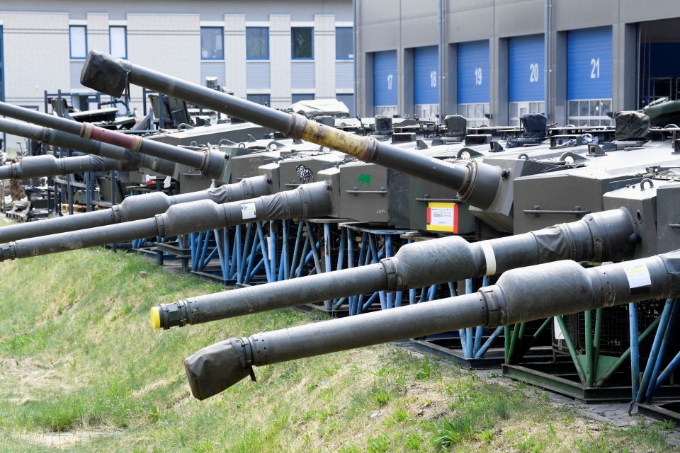 Tank gun barrels and towers for Leopard 2 tanks are pictured at Rheinmetall