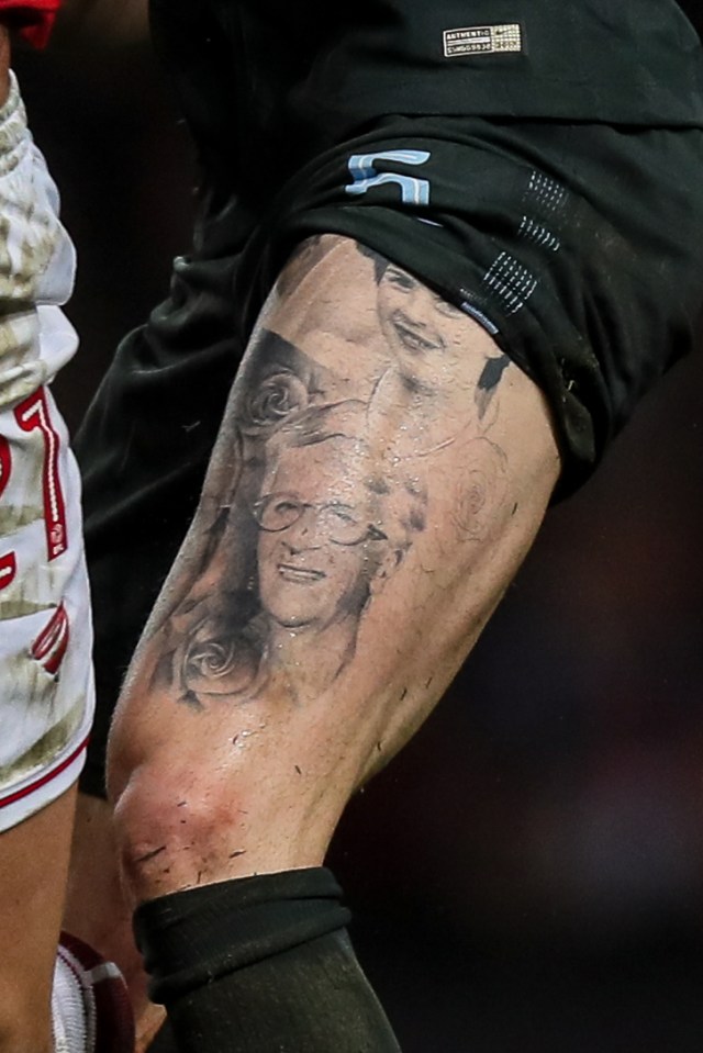 The defender has portraits of each of grandparents on his legs