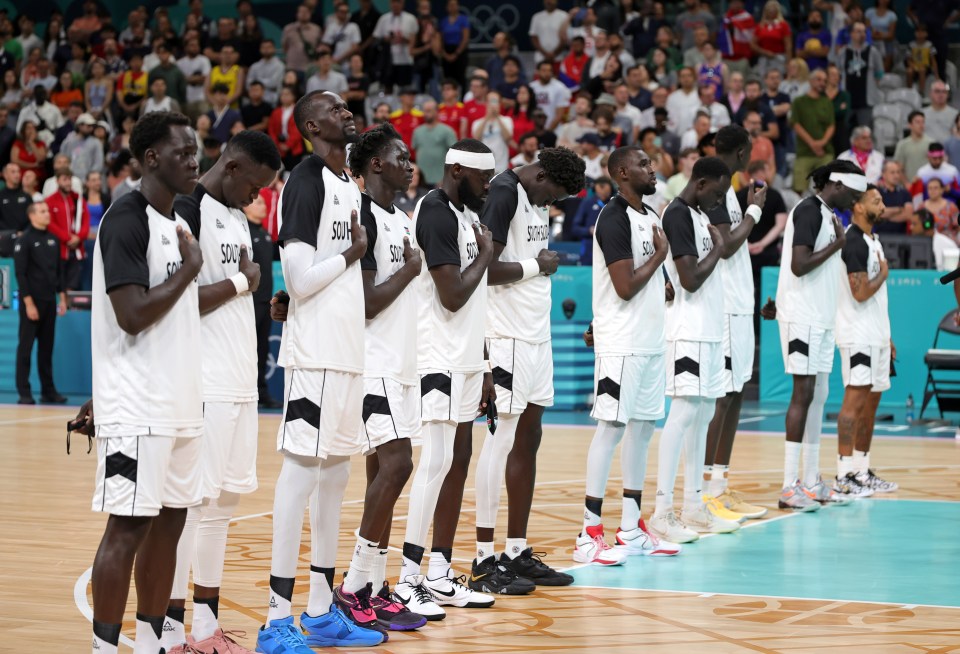 Players stood in unison with their hands over their hearts during the blunder