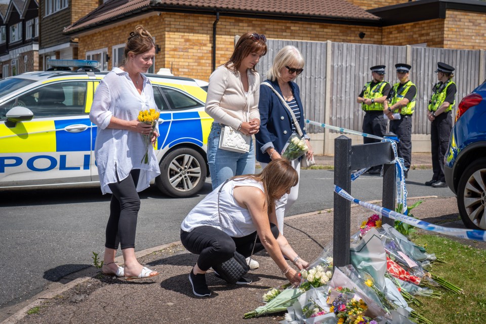 Tributes placed at the scene where Carol Hunt and two of her daughters died