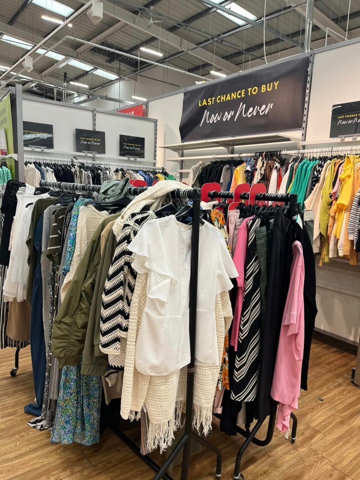 A shopper shared the numerous racks they saw with discounted clothes