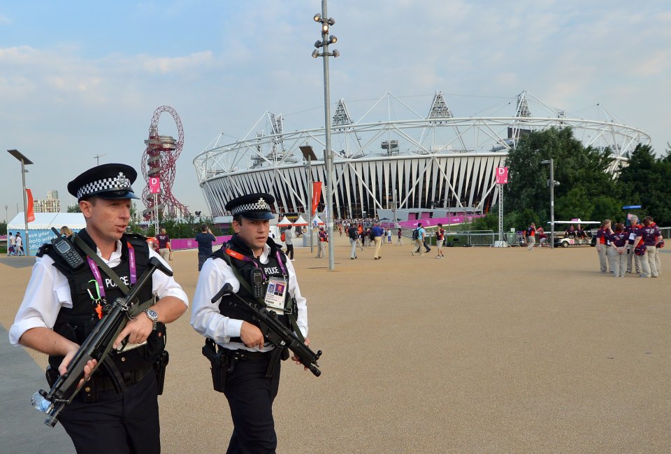 Armed police patrol the Olympic Park in Stratford in 2012