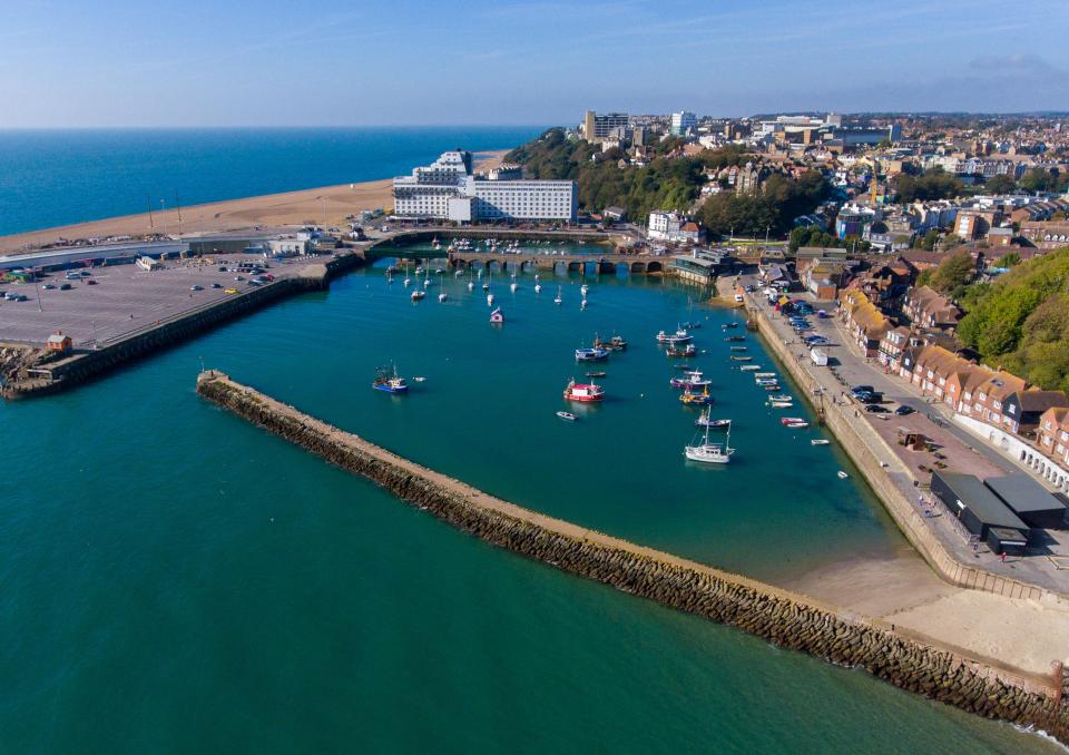 The beach is found just behind the harbour