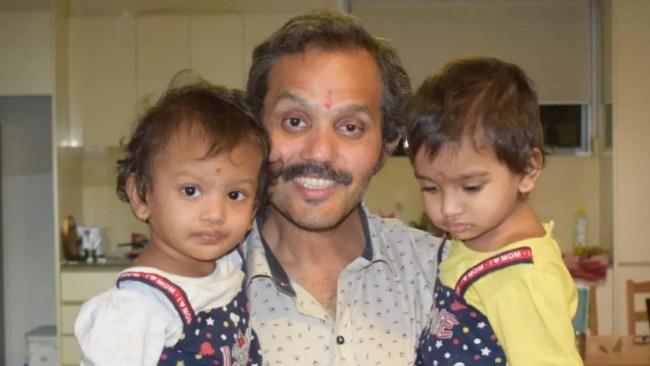 Anand pictured with his two baby girls before the tragic events on Sunday