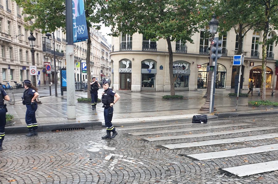 Police put up a cordon in Paris after a suspicious package was found