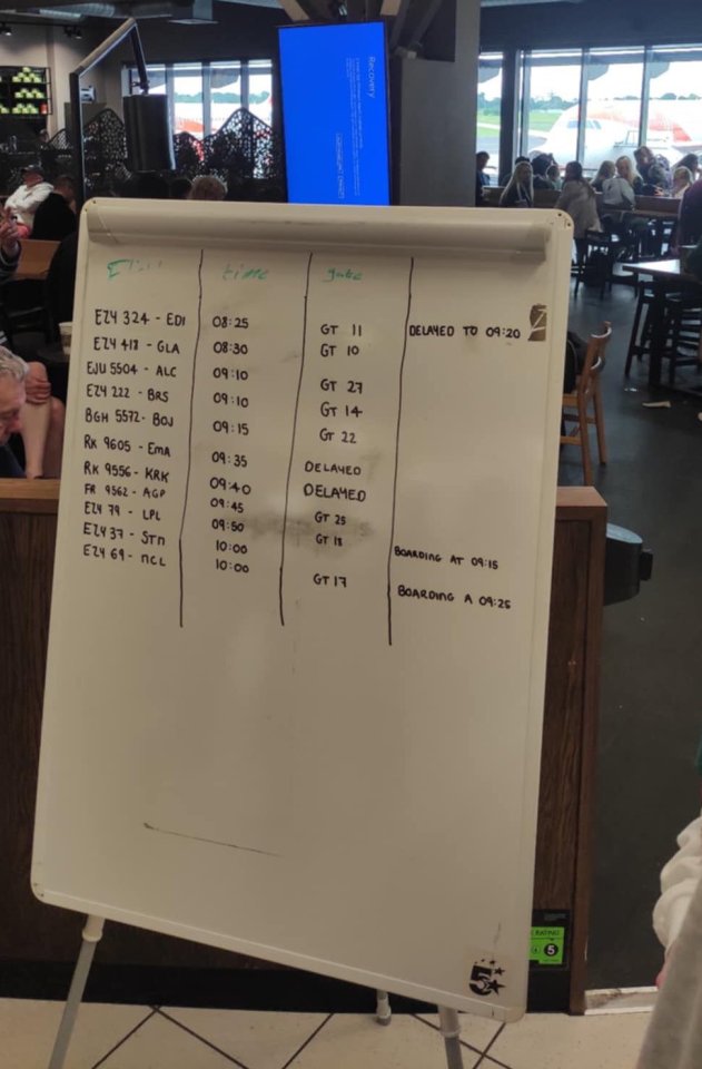 Whiteboard being used at Belfast International Airport after the global IT outage