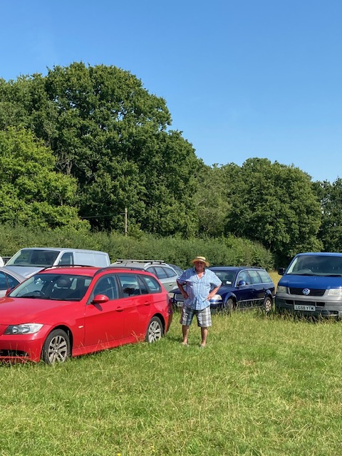 Mr Lewis has thirty to fifty vehicles parked on his land