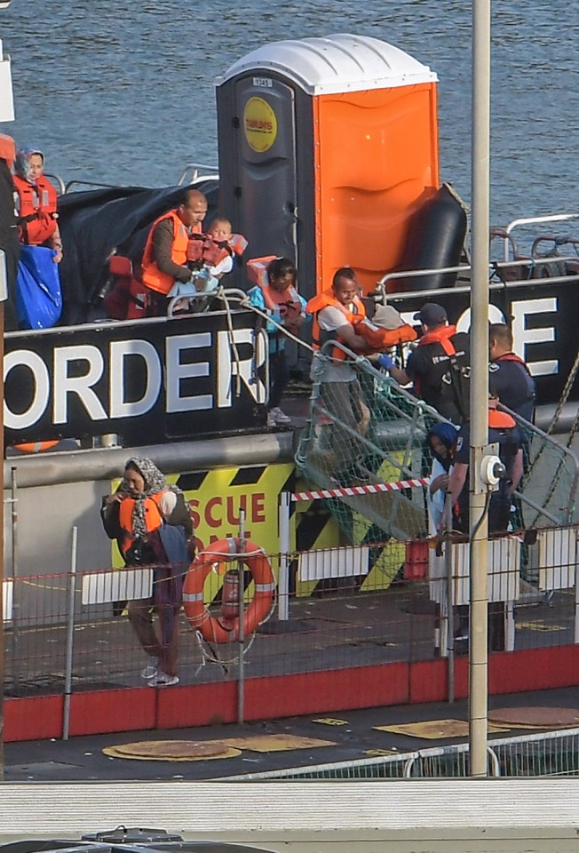 Some of the 211 migrants who made their way across the Channel on Thursday