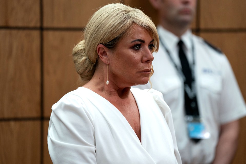 a woman in a white dress stands in front of a police officer