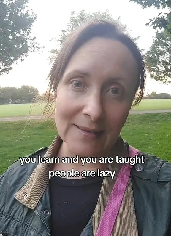 a woman in a park says you learn and you are taught people are lazy