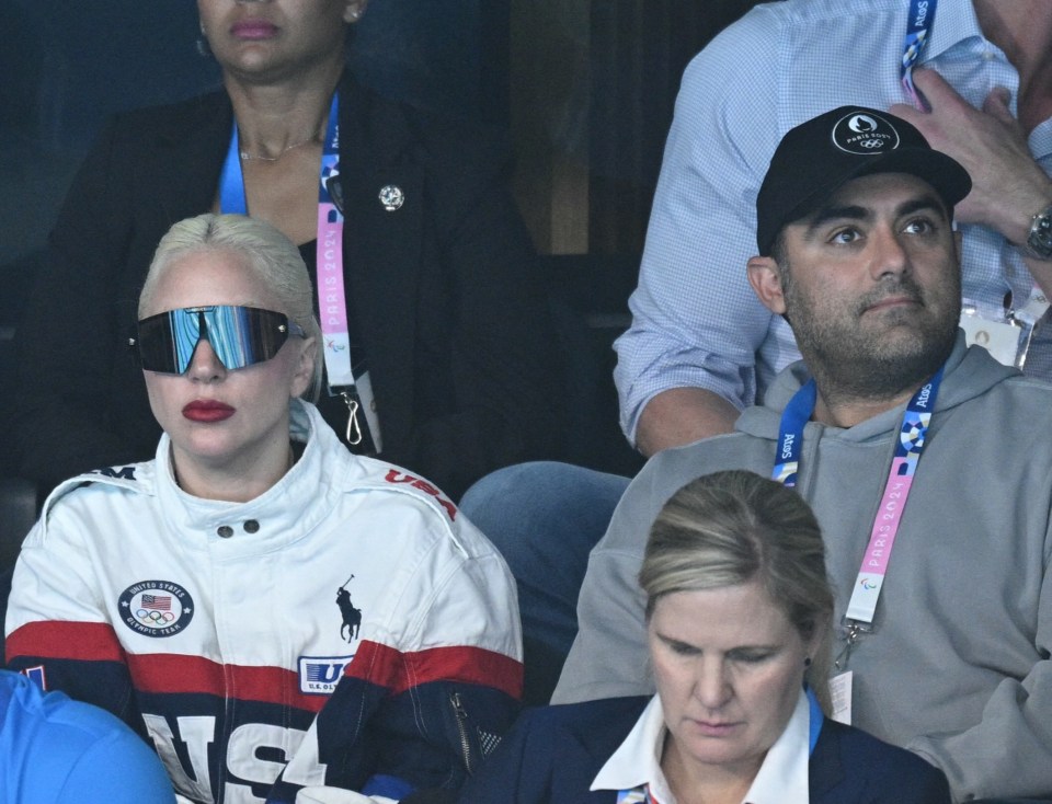 Lady Gaga stuck around with fiancé Michael Polansky after the opening ceremony to watch some events