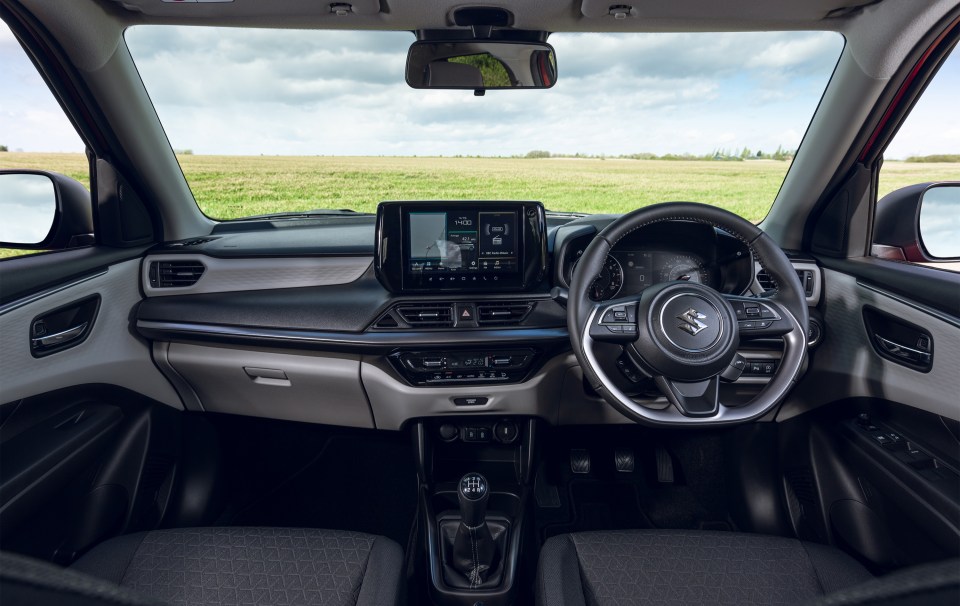 a picture of the interior of a suzuki car