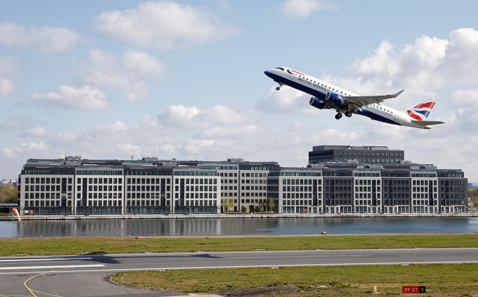 a british airways plane is taking off from a runway