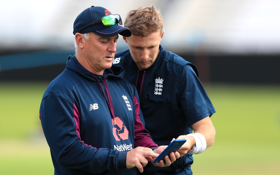 Thorpe, pictured with cricketer Joe Root, became England's batting coach