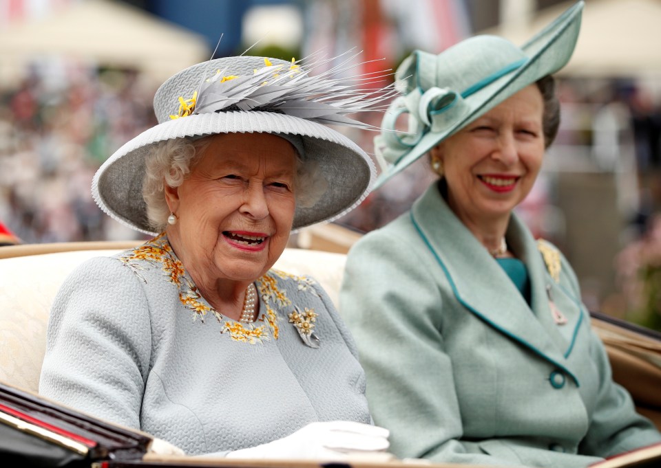 queen elizabeth ii and princess anne are smiling for the camera