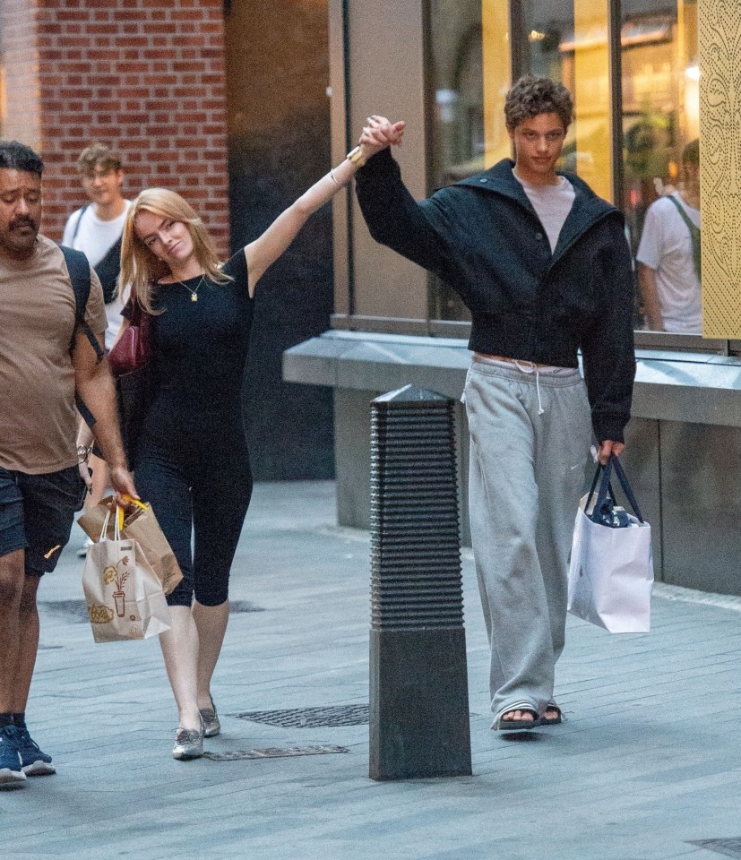 Bobby Brazier and Virginia Hampson wandered though London holding hands