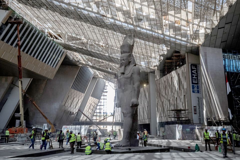 The 3,200-year-old pink-granite colossal statue of King Ramses II at the entrance of the Grand Egyptian Museum Credit: AFP