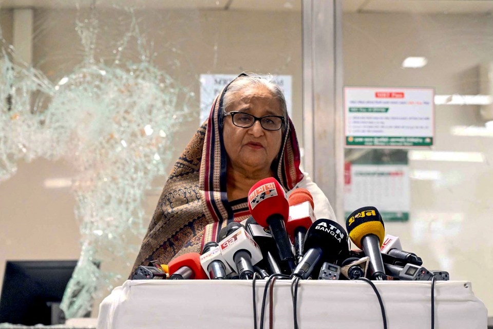 Hasina addresses the media at a vandalised metro station last month