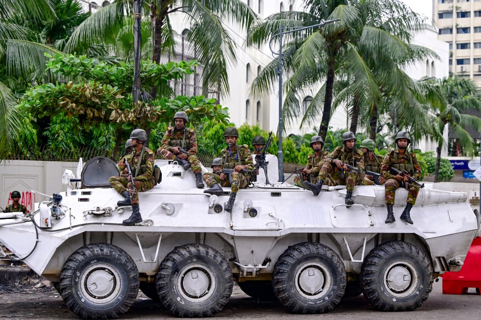 Bangladesh army personnel stood guard during a curfew imposed on the country over the past few days which has now been lifted