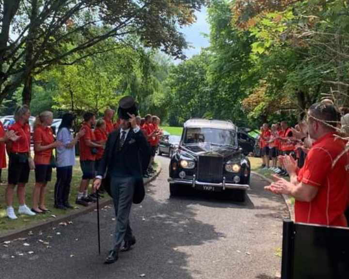 Royal Mail workers donned the distinctive red uniform and lined up in formation outside the Bramcote Crematorium to form a guard of honour for Lee