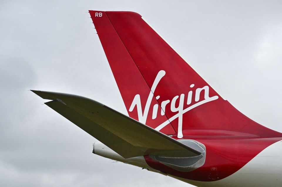 the tail of a virgin airlines plane is shown