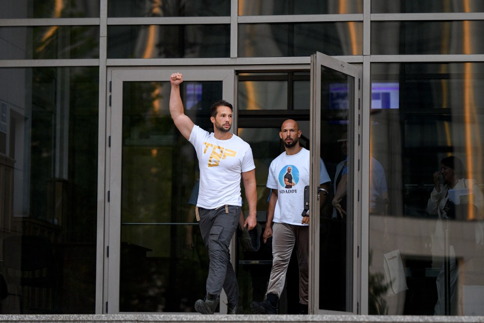 Brothers Tristan (L) and Andrew Tate leaving court on Thursday