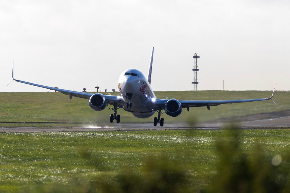 A Jet2 aircraft is blown sideways as it takes off from Leeds Bradford airport