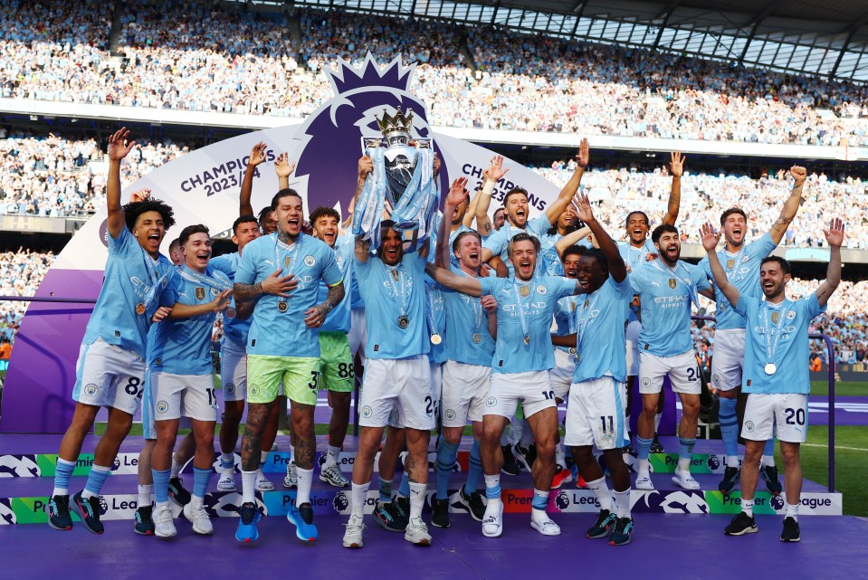 a group of soccer players holding up a trophy that says champions 2022