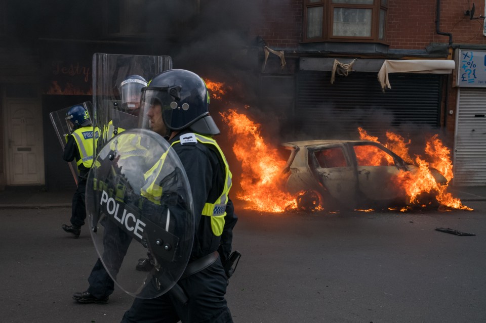 A car burns during disturbances in Middlesbrough yesterday