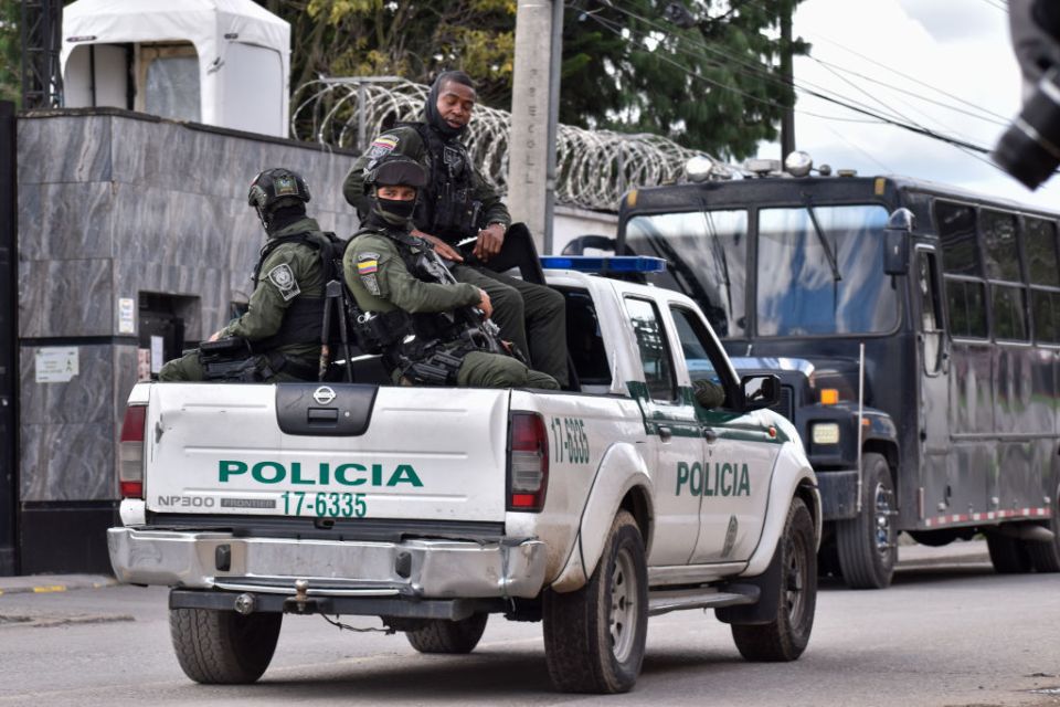 Prison guards patrol the perimeters of the Modelo prison, in Bogota, Colombia