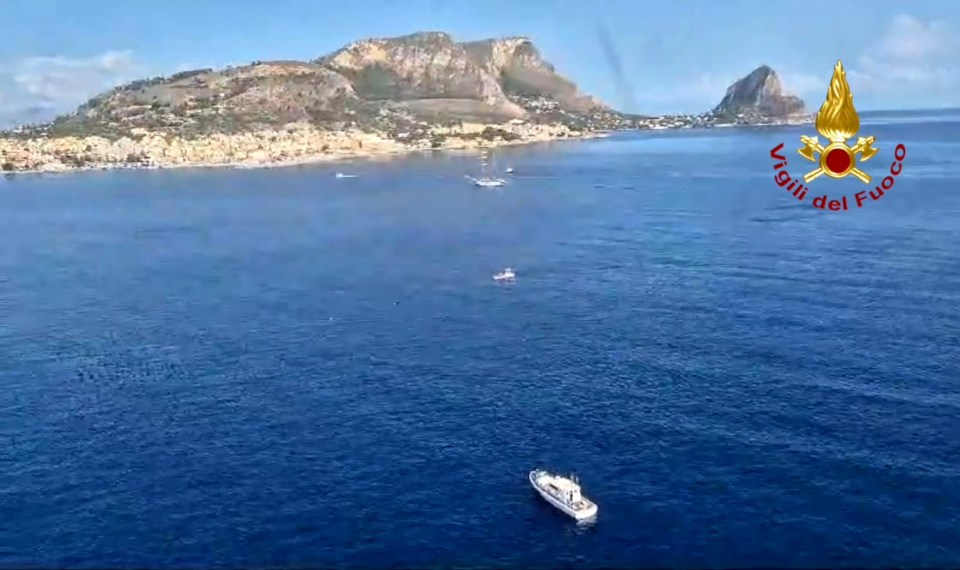 an aerial view of a body of water with a logo for vigili del fuoco