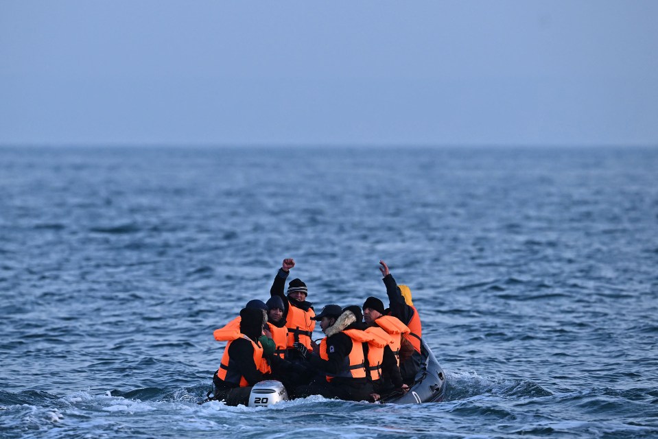 a group of people in a boat with a honda outboard motor