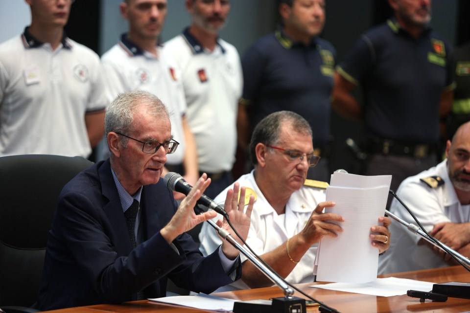 Chief prosecutor Ambrogio Cartosio (L) speaks next to Rear Admiral Raffaele Macauda at a press conference