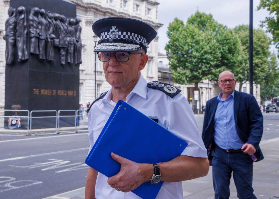 Footage shows Metropolitan Police Commissioner Sir Mark Rowley seemingly putting his hand over a reporter's mic